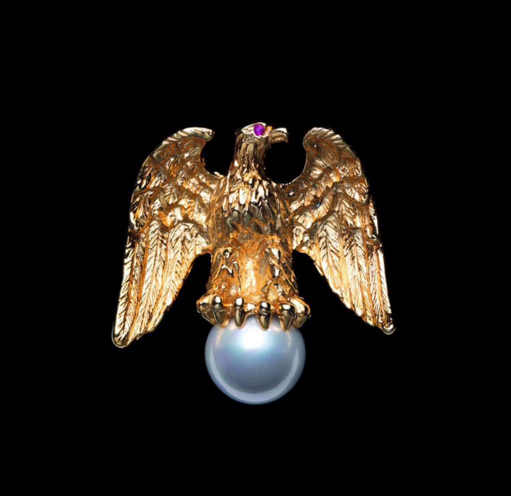 Gold eagle on pearl