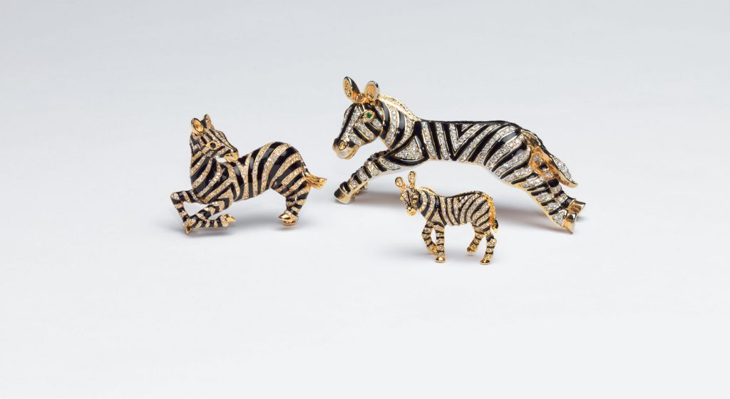 Three zebra pins of various sizes